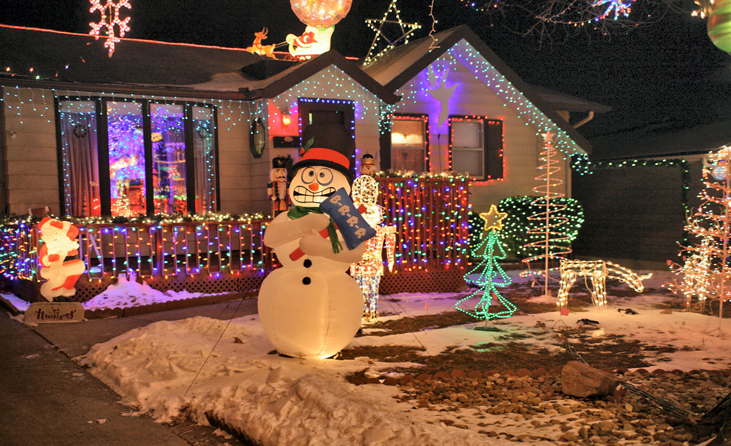 A variety of Christmas lights decorate a yard on Wood River Drive, near 51st and Harrison streets.